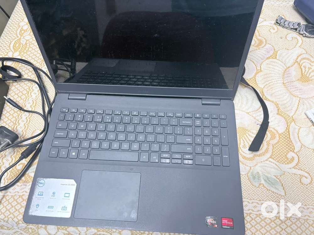 DELL LAPTOP WITH ORIGINAL BAG AND ORIGINAL CHARGER