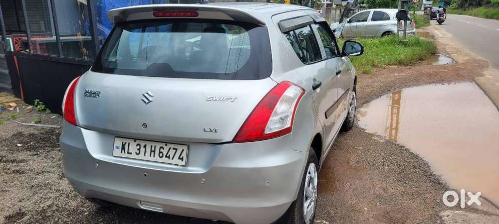 Maruti Suzuki Swift 1.2 Lxi (o), 2015, Petrol