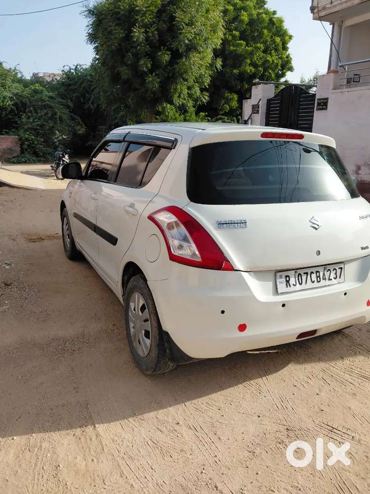 Maruti Suzuki Swift Lxi 2014