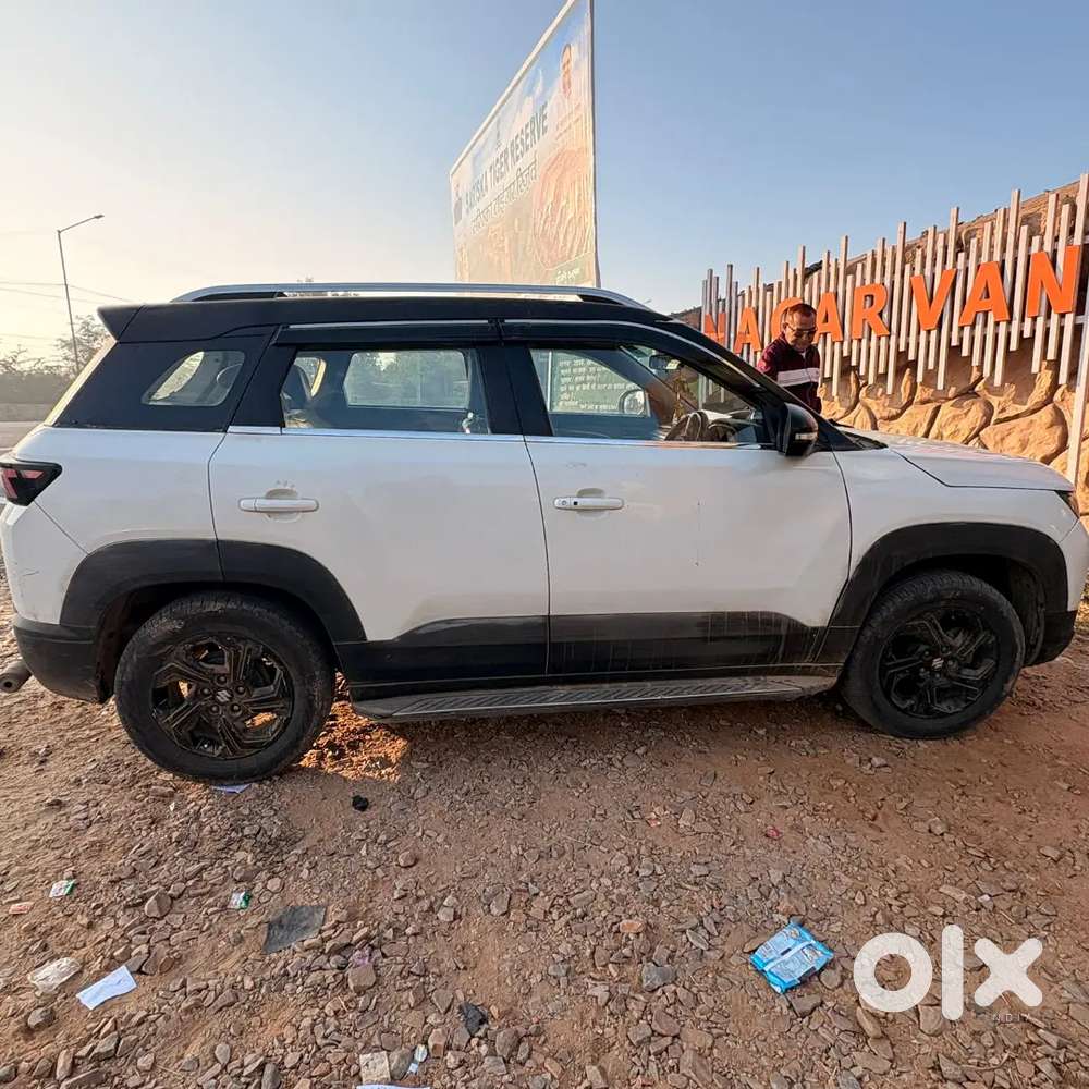 Model Name -brezza Smart Hybrid Zxi,model 2023,
