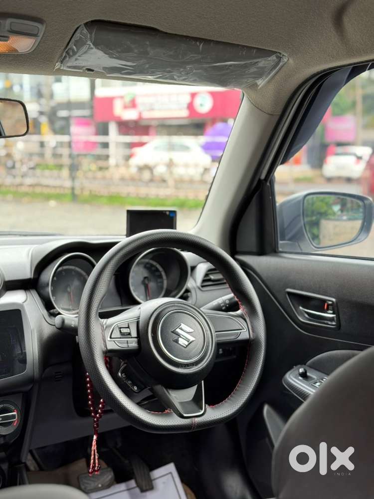 Swift 1.2 Vxi 2021 Km Driven