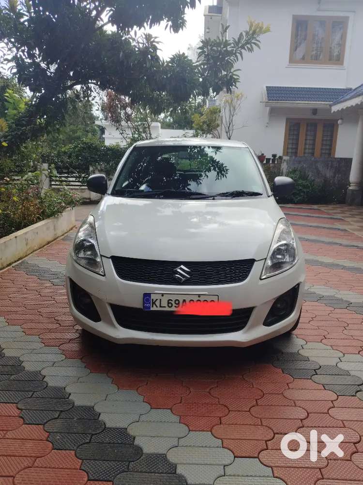 Maruti Swift Lxi 2018 Km Driven