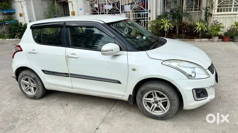 Maruti Suzuki Swift Lxi 2016