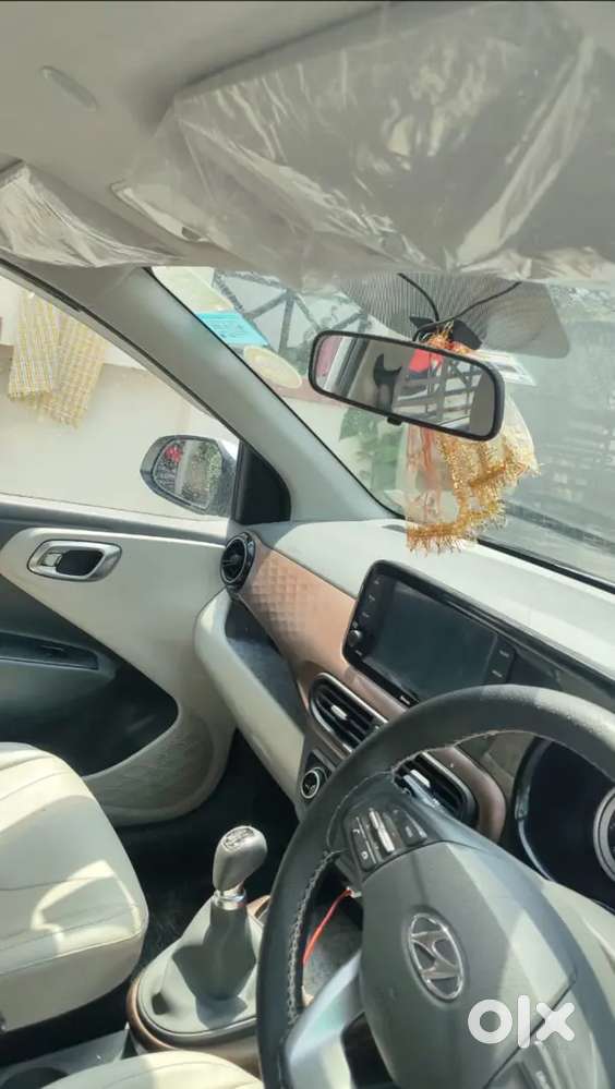 Bank Manager Owned Hyundai Aura Top End Model With Cruise Control.