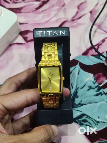 Titan raga golden color on sale watch