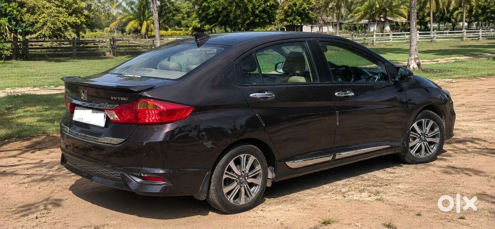Honda New City V (petrol + Cng) Golden Brown