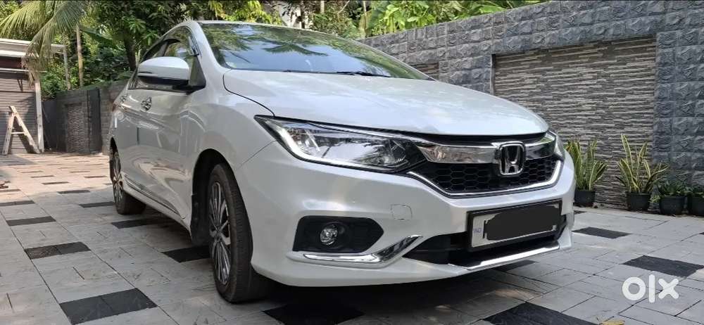 Low Km, Well Maintained And Sunroof Car