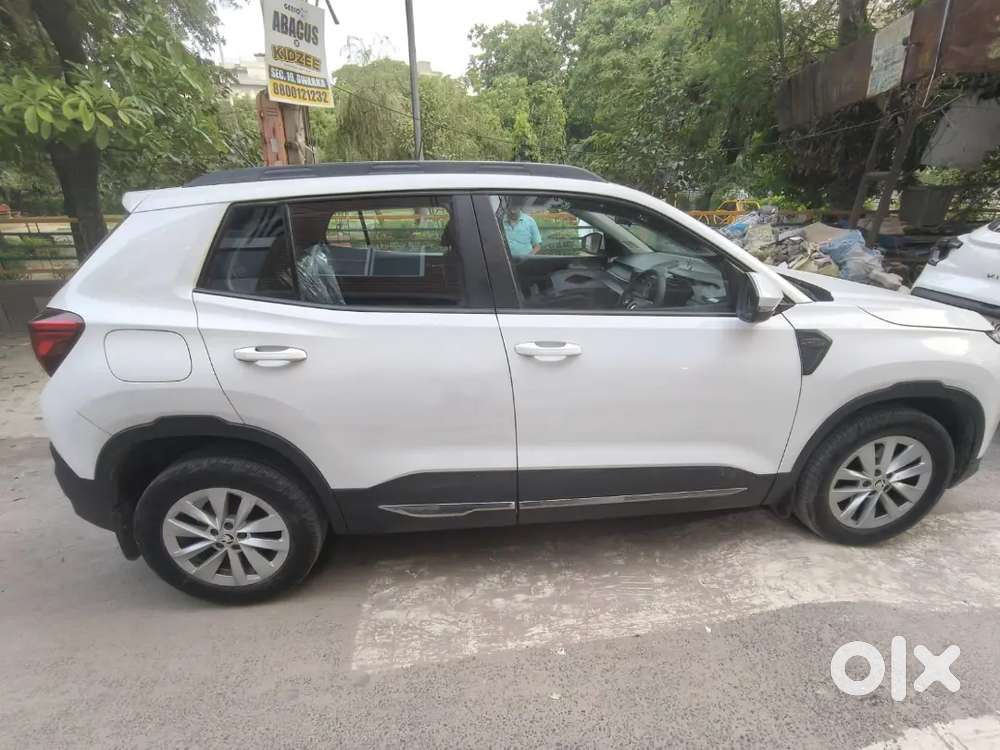 Škoda Kylaq Signature 1.0 Tsi Mt  March 2025  Single Owner  Candy W