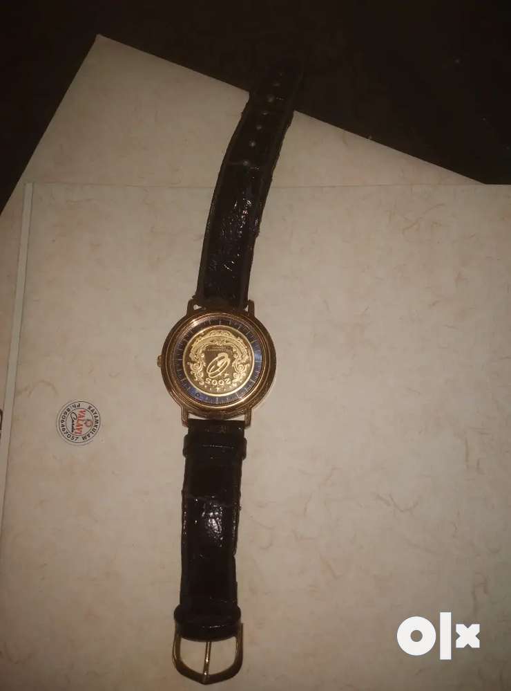 Gold quest watch clearance price