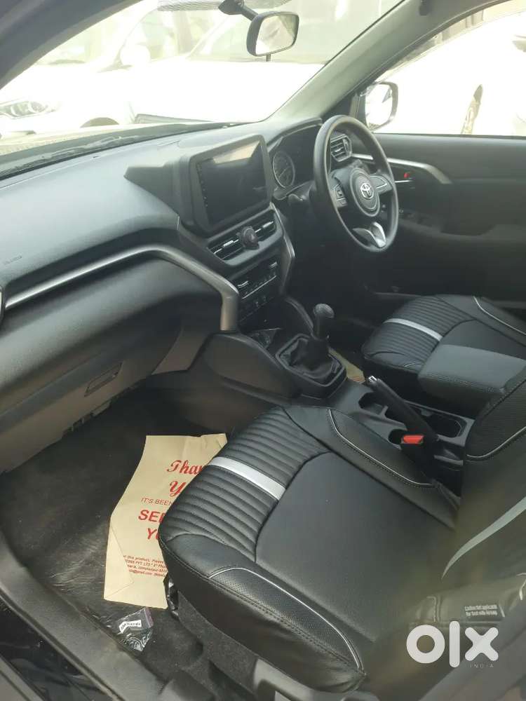 Toyota New Hyryder With Scooty Free In It.