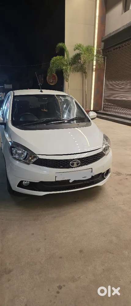 It's Tata Tiago Diesel Excellent Condition With Ceramic Cote