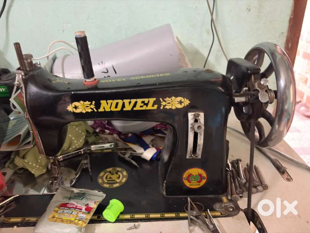 Sweing machine and ring spanner