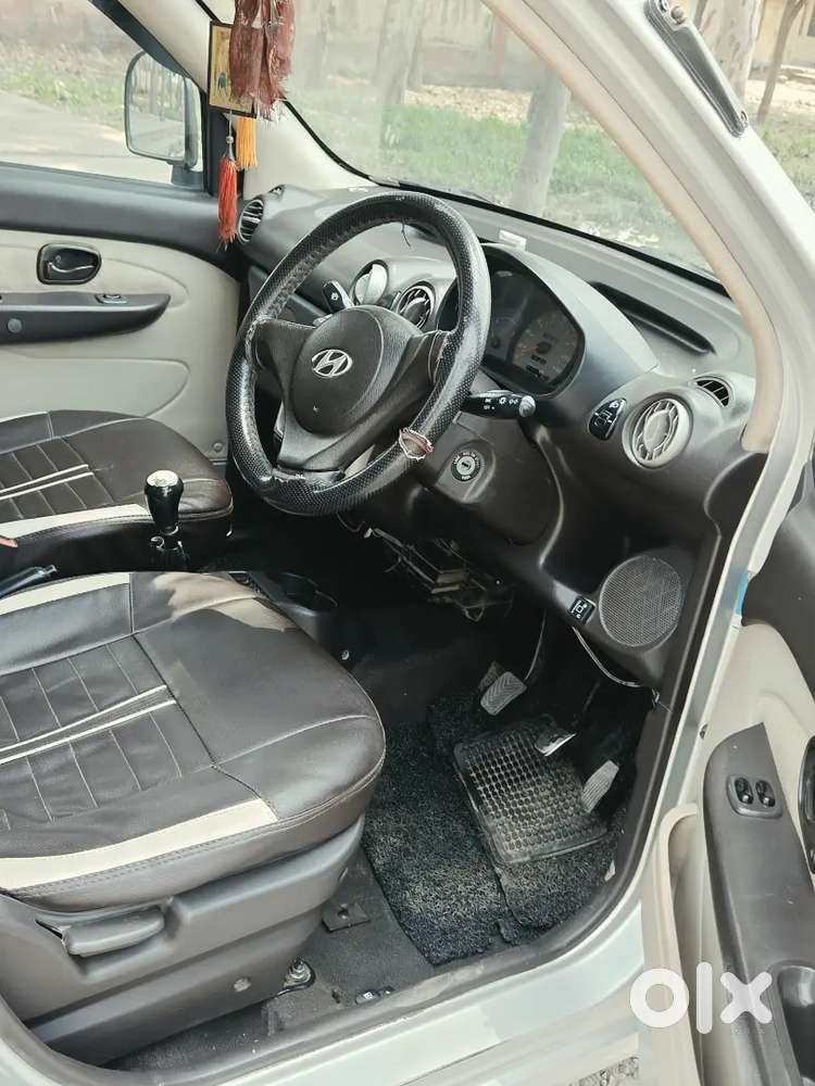 Santro Glx,  Petrol /cng On Paper 
Running.. 62000/-  Price.. 1.65/-