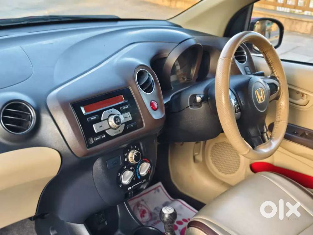Honda Brio Sporty Look 
 Magwiil Spot Tire Center Lock