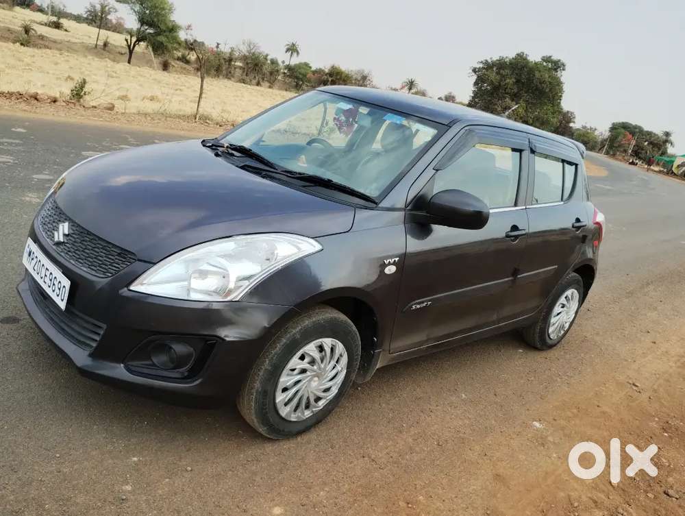 Maruti Suzuki Swift Lxi 2015