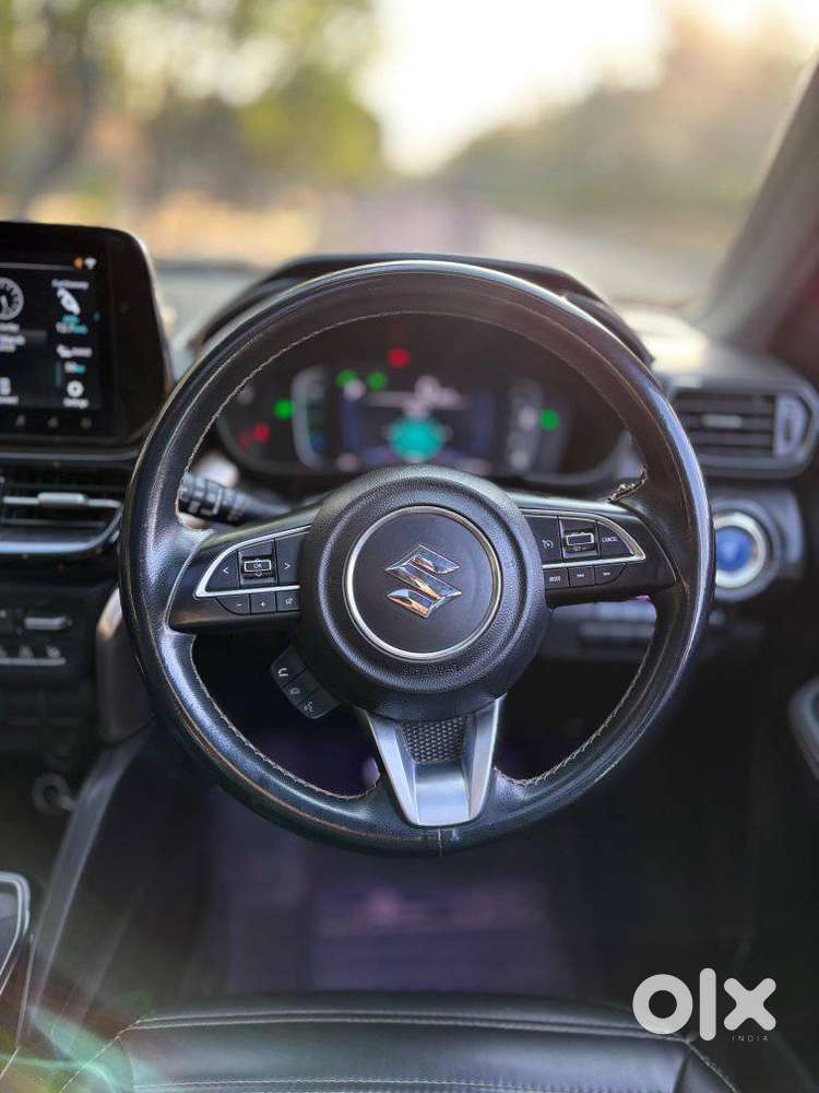 Maruti Suzuki Grand Vitara 1.5 Zeta Plus Dual Tone Intelligent Hybri..