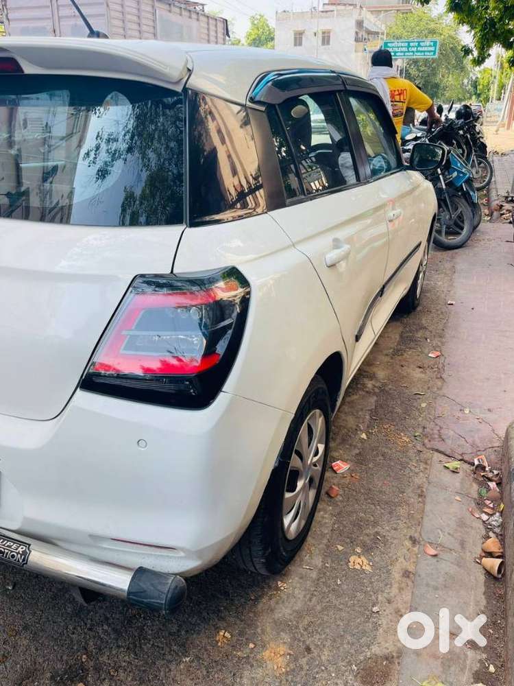 Maruti Suzuki Swift 1.2 Vxi (o), 2024, Petrol