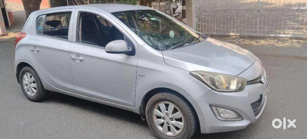 I20, 2nd Owner, Gujrat Registration, Petrol, Sportz ,silver Color,.
