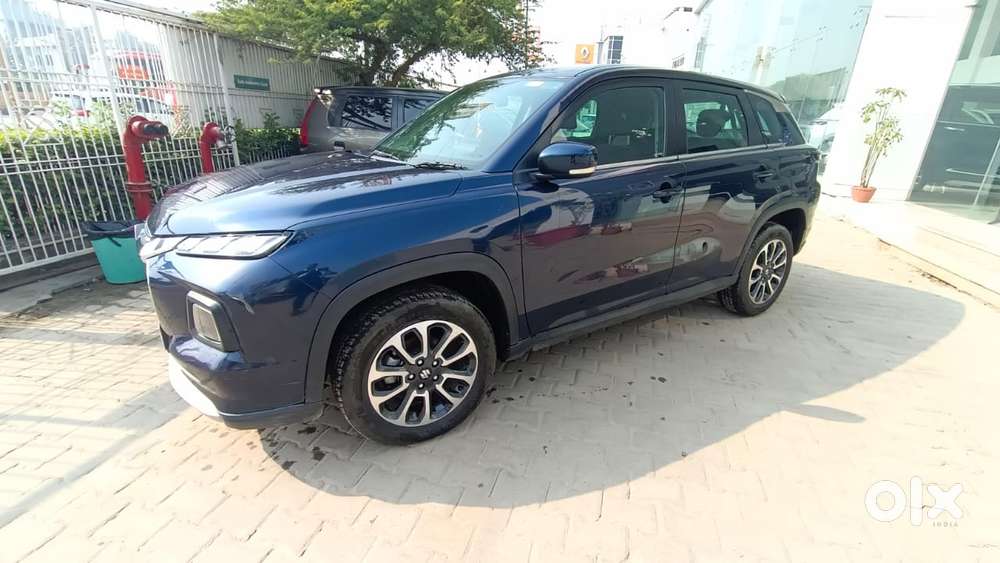 Maruti Suzuki Grand Vitara 1.5 Zeta Plus Dual Tone Intelligent Hybri..