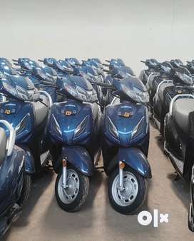 Scooty price below discount 10000