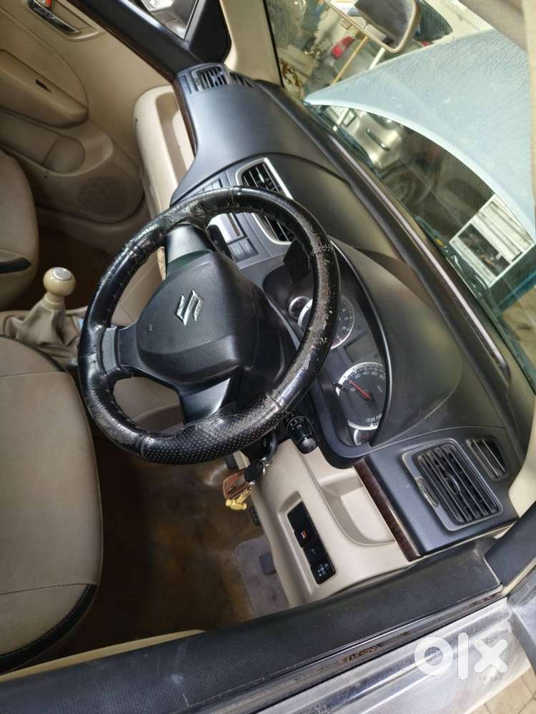Swift Dzire 2012 Petrol Manual ( Glistening Gray - Well Maintained)