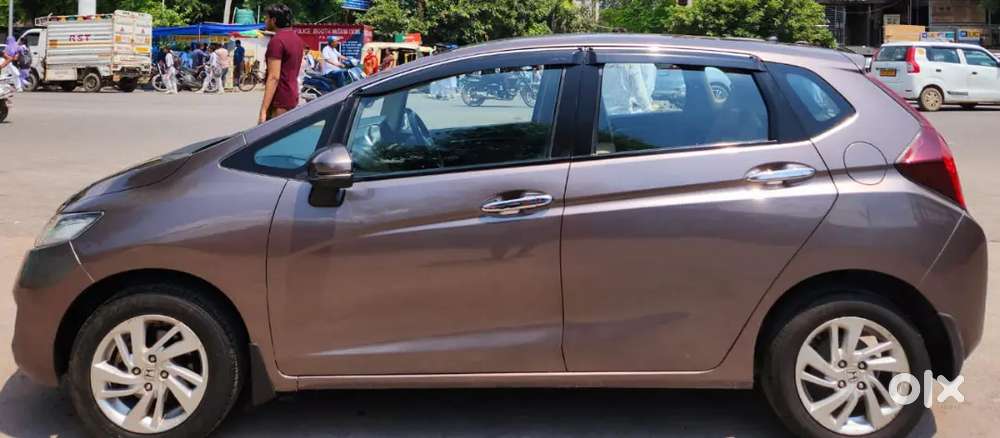 Honda Jazz  58,000 Km  Excellent Condition  Relocating Urgent Sale