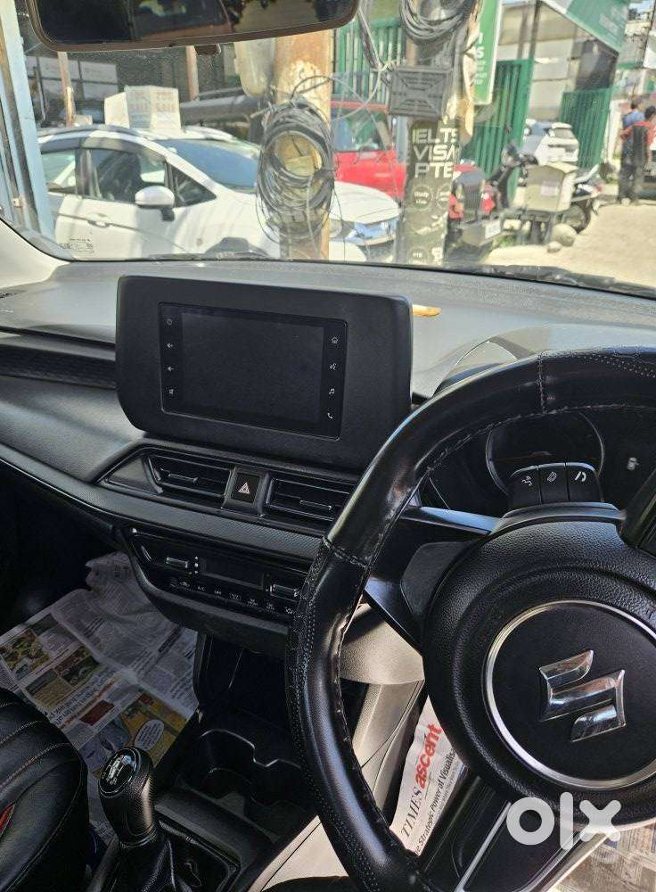 Maruti Suzuki Swift 1.2 Vxi (o), 2024, Petrol