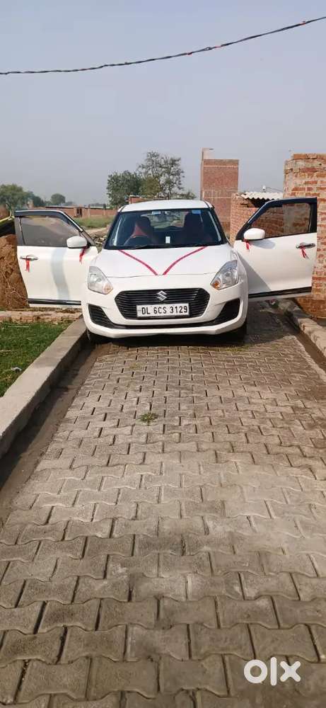 Maruti Suzuki Swift Lxi 2019