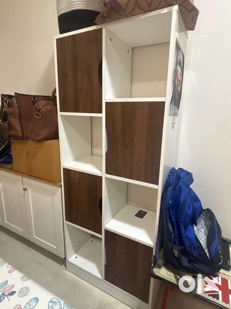 Book shelf in very unique design , new rarely used and has storage