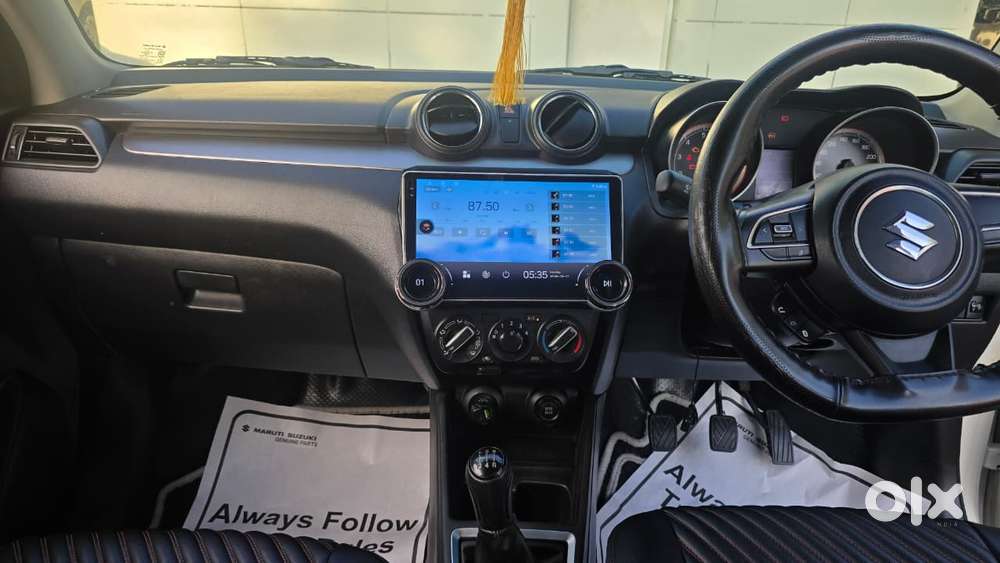 Maruti Suzuki Swift 1.2 Vxi (o), 2023, Petrol