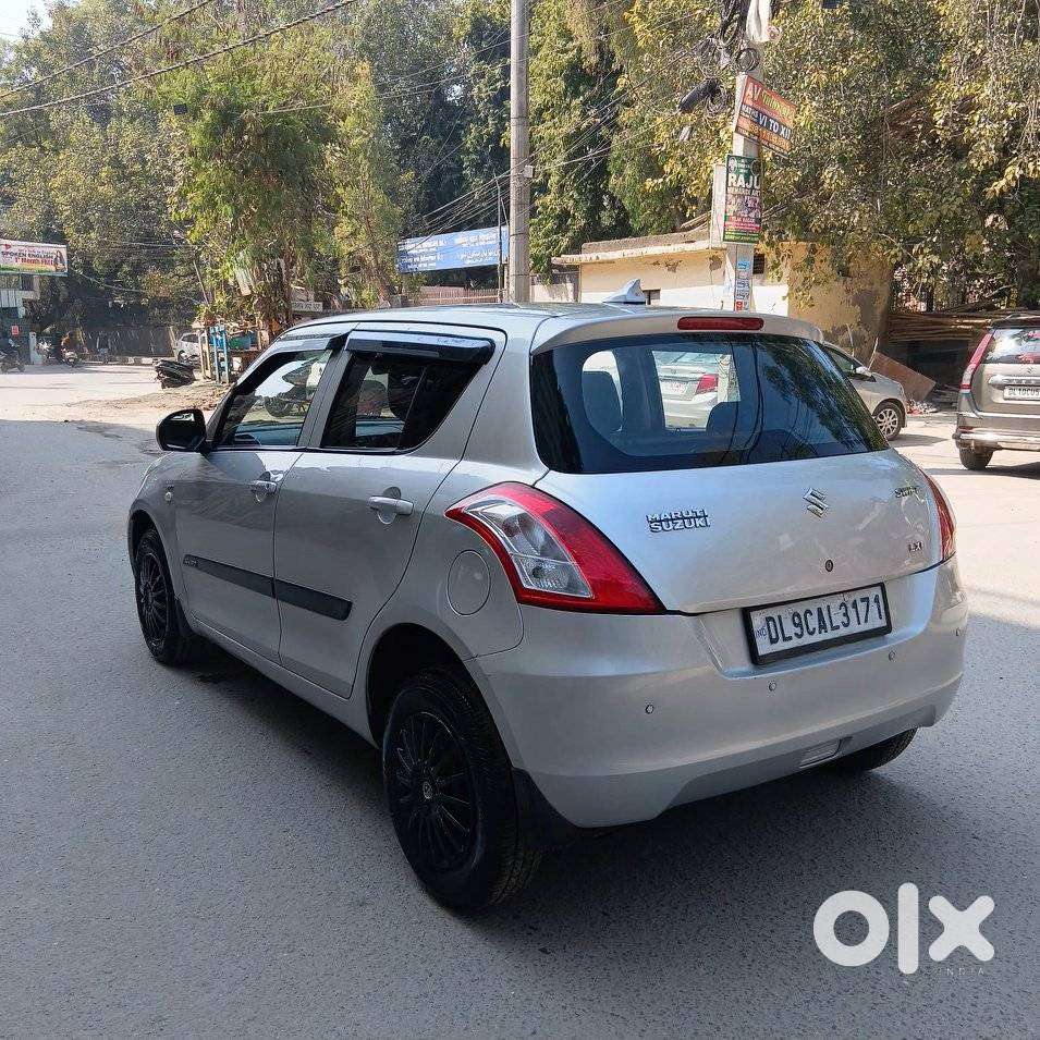 Maruti Suzuki Swift Lxi Optional-o, 2015, Petrol