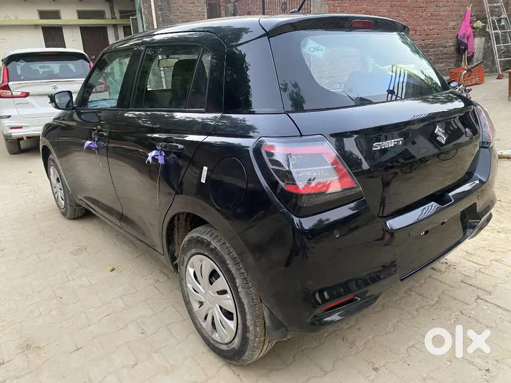Maruti Suzuki Swift Vxi 2026