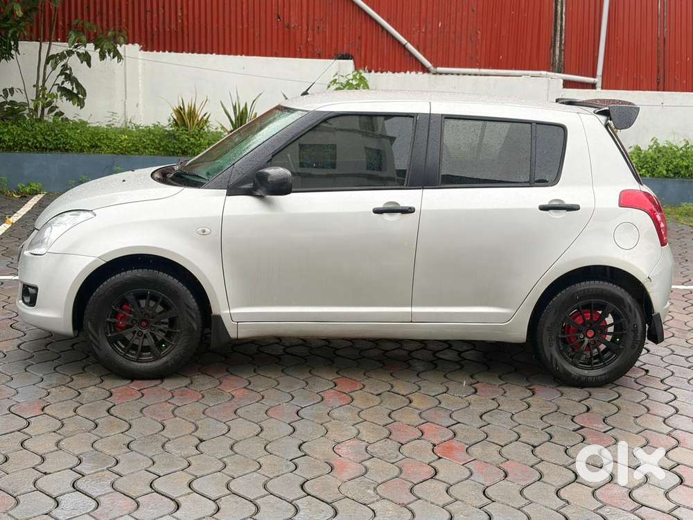 Maruti Suzuki Swift 1.2 Vxi (o), 2010, Petrol
