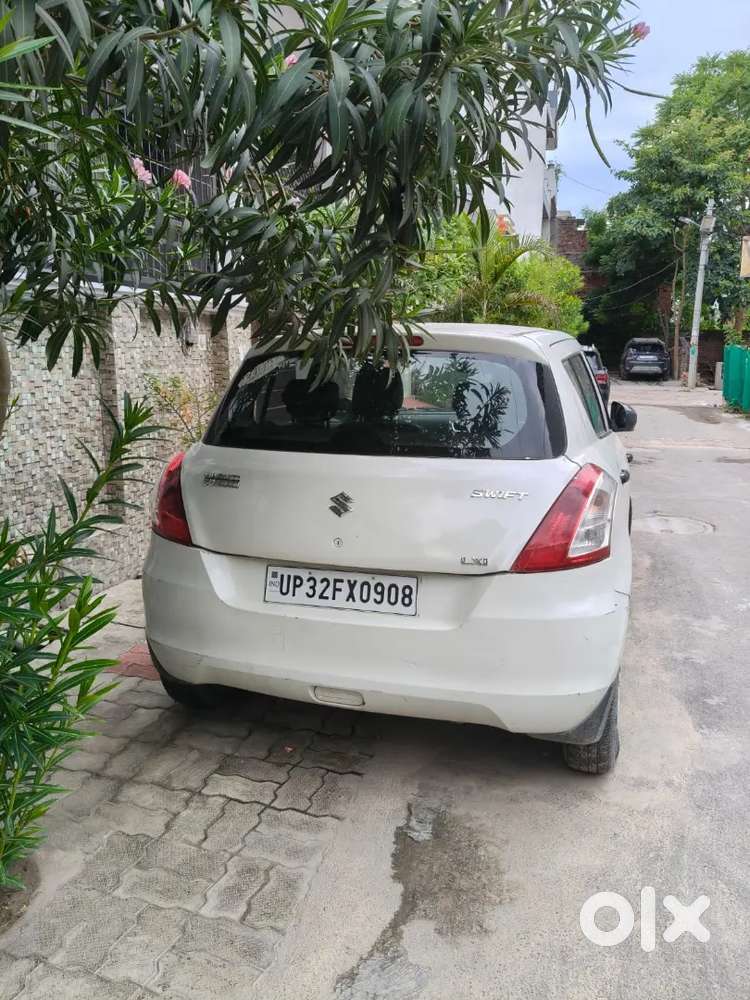 Maruti Suzuki Swift 2014 Petrol 89000 Km Single Hand Driven Pearl Whit