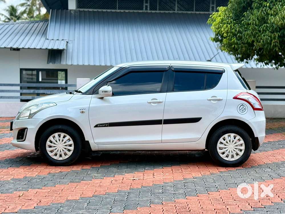 Maruti Suzuki Swift 1.2 Lxi (o), 2015, Petrol
