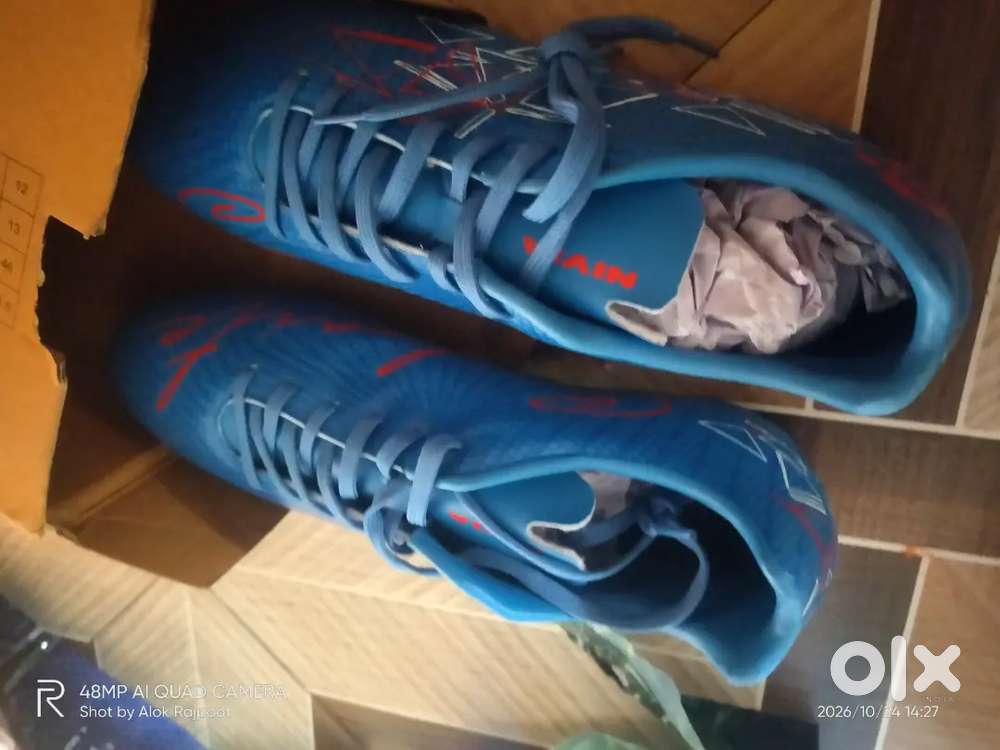 Football shoes , pads , long socks and short socks