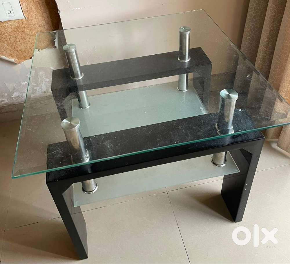 Glass Top Centre/ Coffee Table in mint condition with shelf storage