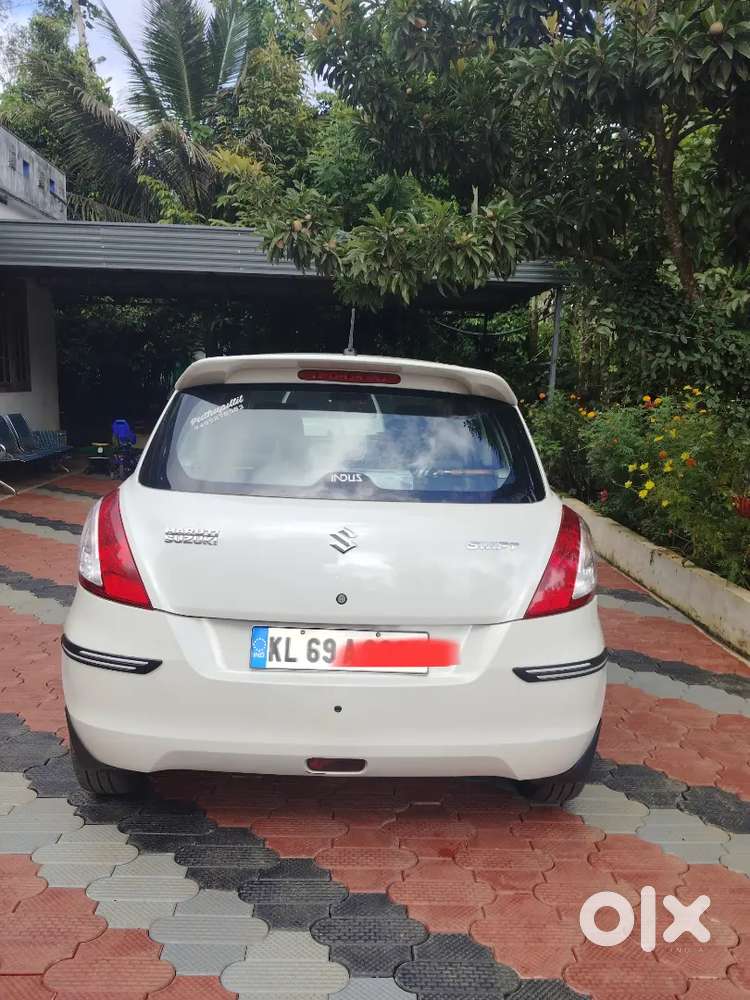 Maruti Swift Lxi 2018 Km Driven