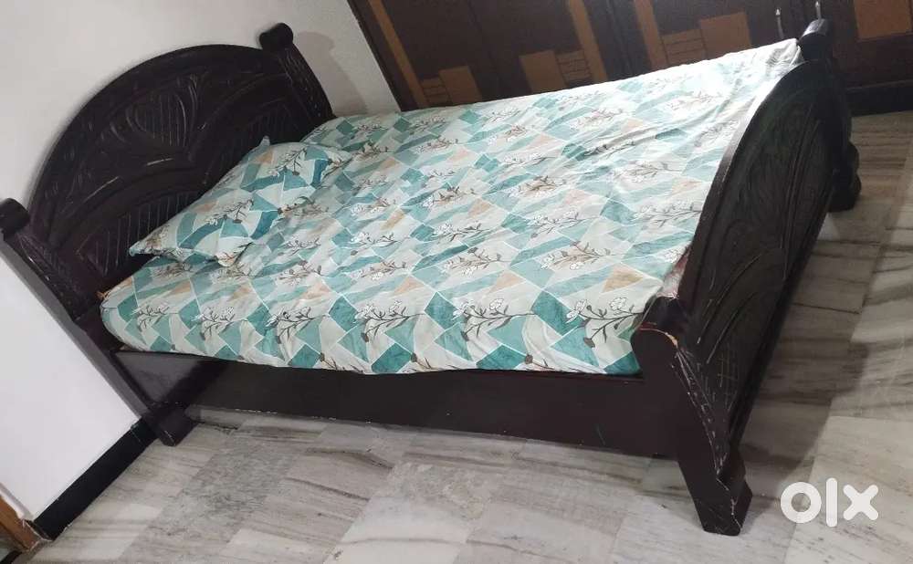 Used single cot with bed
