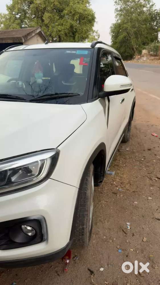Maruti Brezza Lxi 2020 Model  Drive 80000 Km