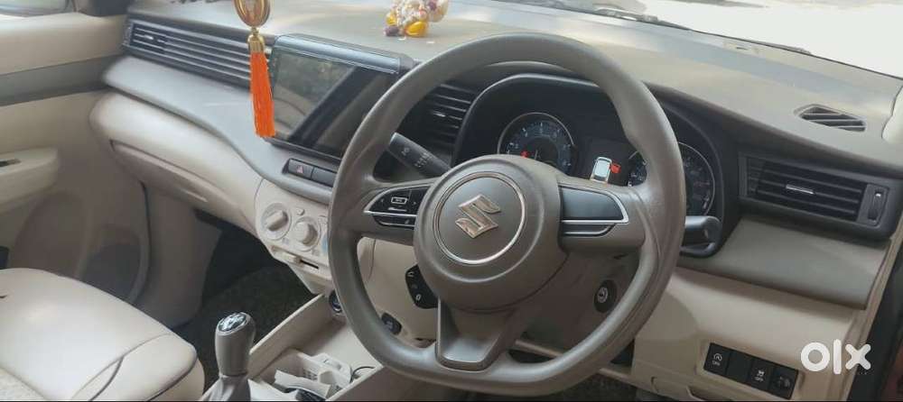 Ertiga Smart Hybrid Vxi (o) , Colour -prme. Auburn Red