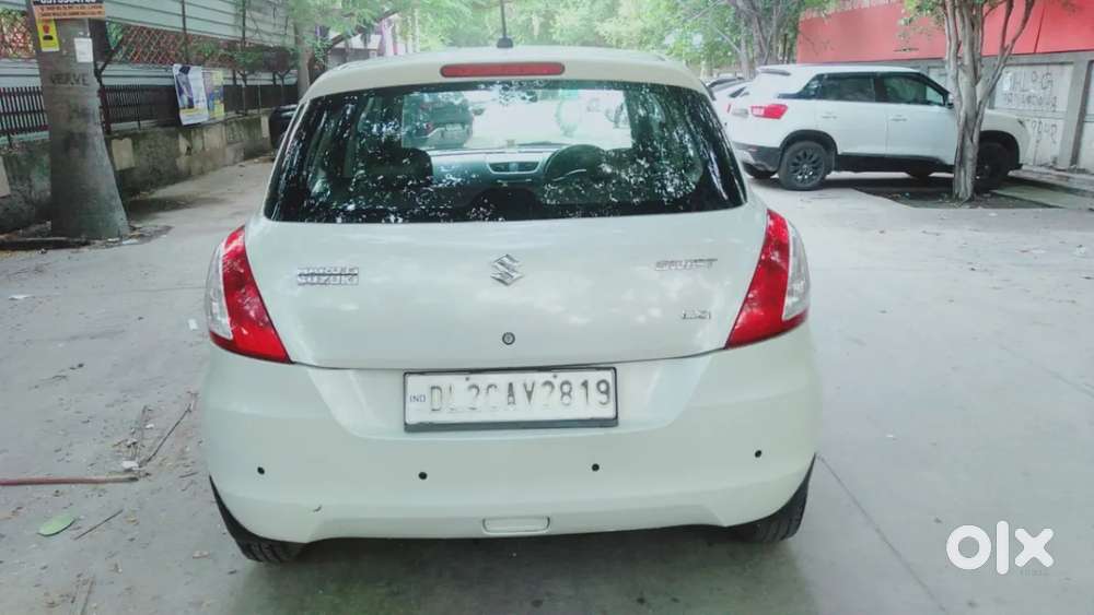 Maruti Suzuki Swift Lxi Optional-o, 2016, Petrol