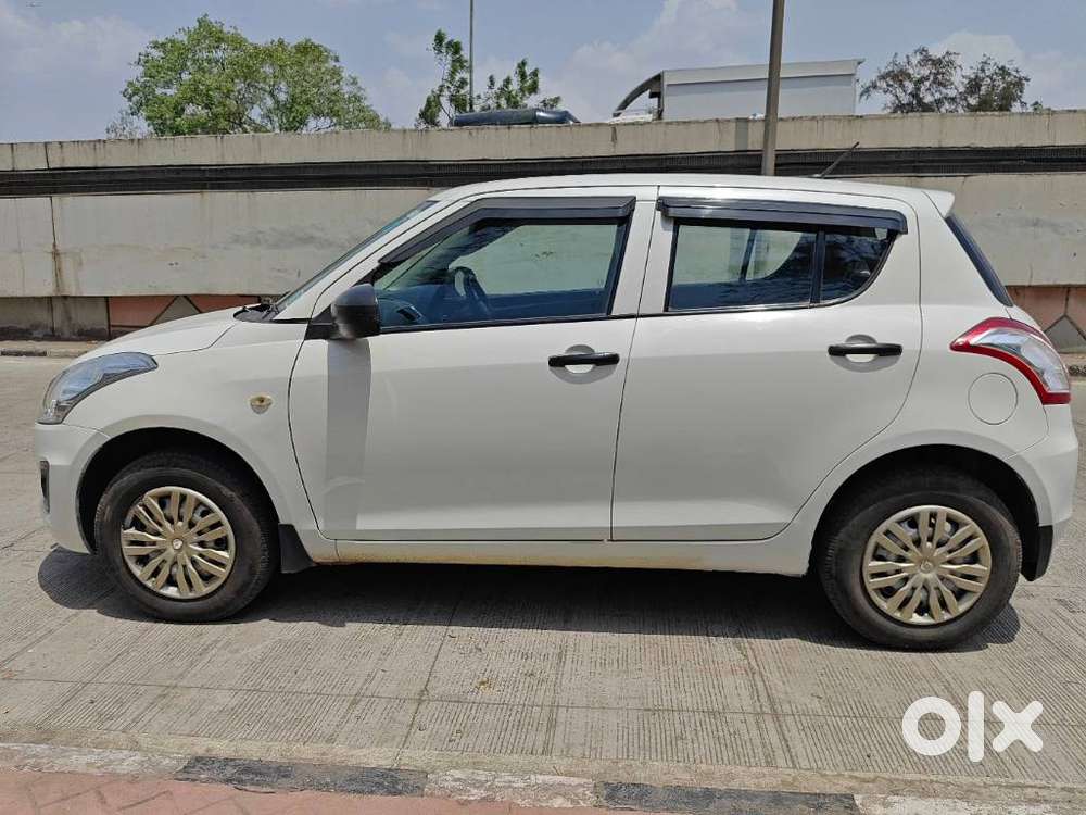 Maruti Suzuki Swift Lxi Optional-o, 2016, Petrol