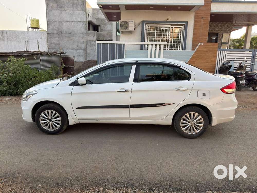 Ciaz Zxi .