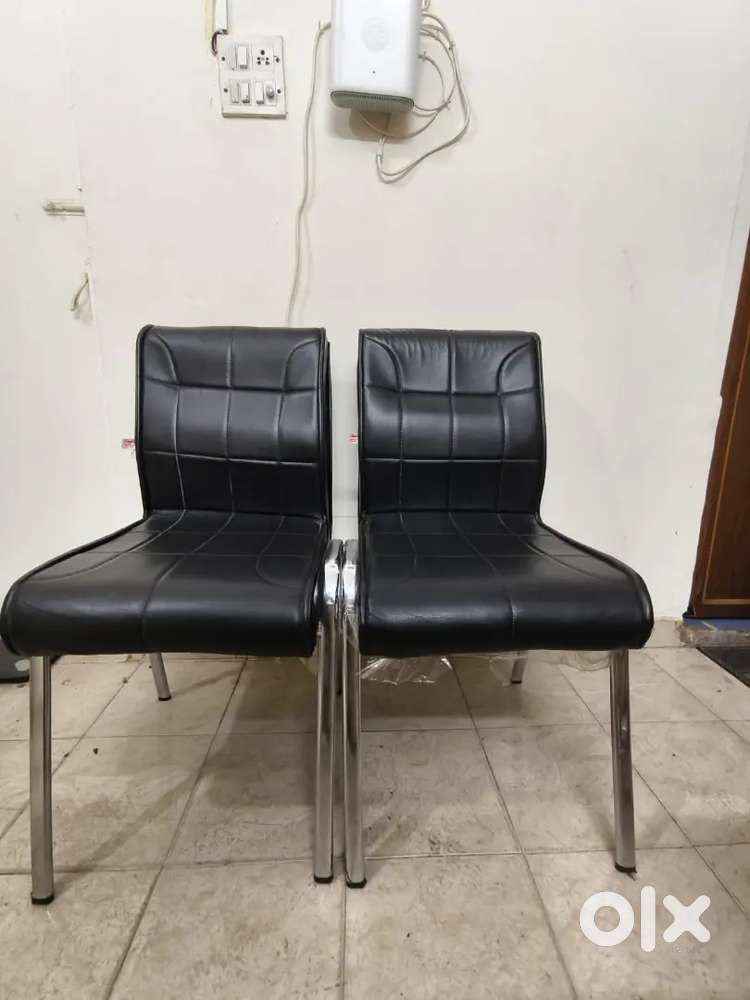 Two Office Chairs without Arms