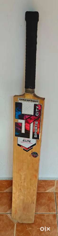 Tennis ball Cricket bat