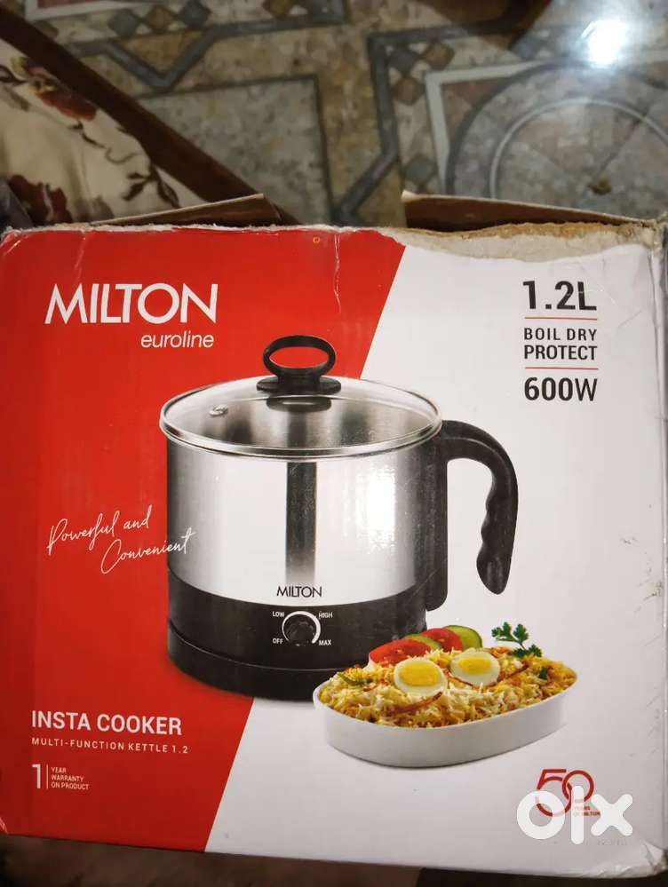 Brand new Milton Insta Cooker 1.2L 600W with Lid & Steamer