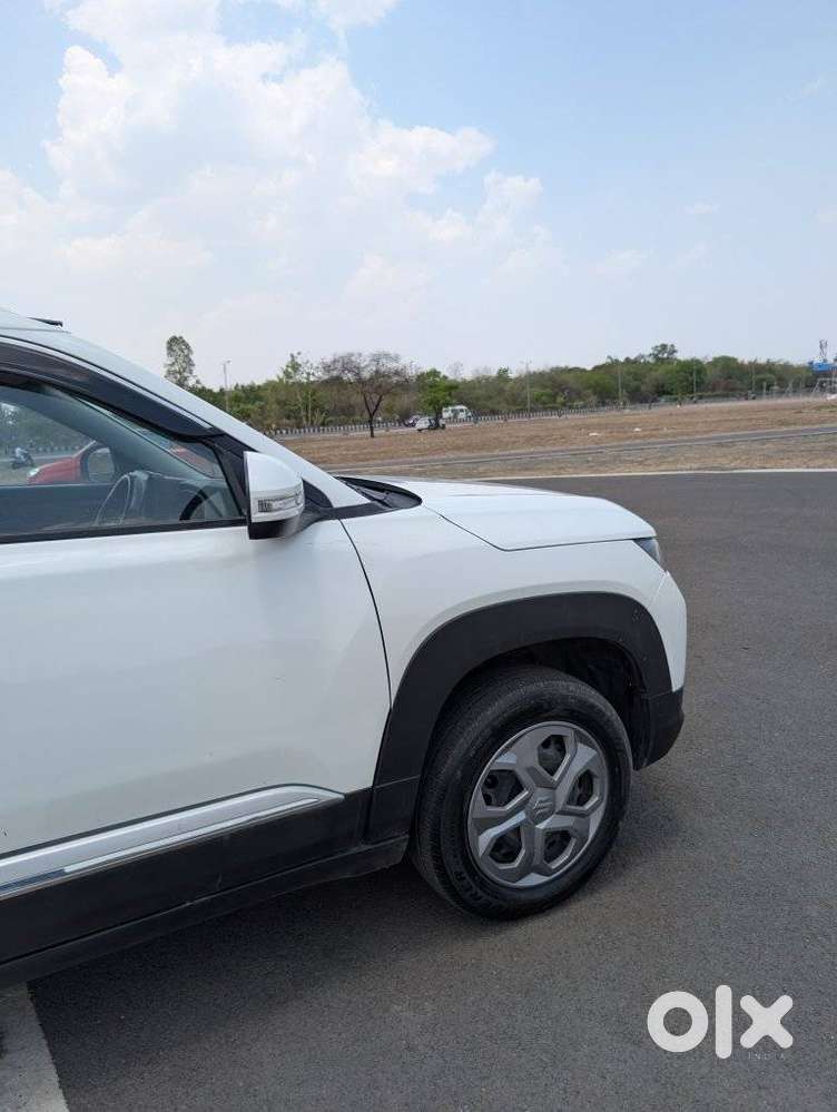 Maruti Suzuki Brezza 1.5 Lxi Smart Hybrid, 2024, Petrol