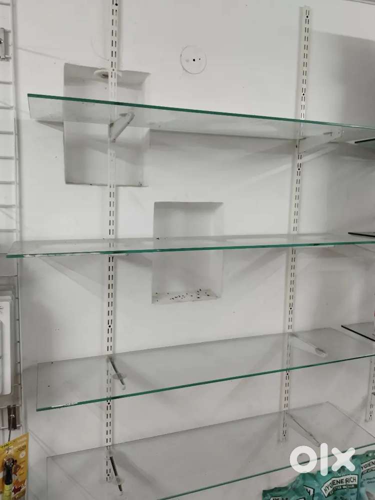 Glass adjustable shelf
