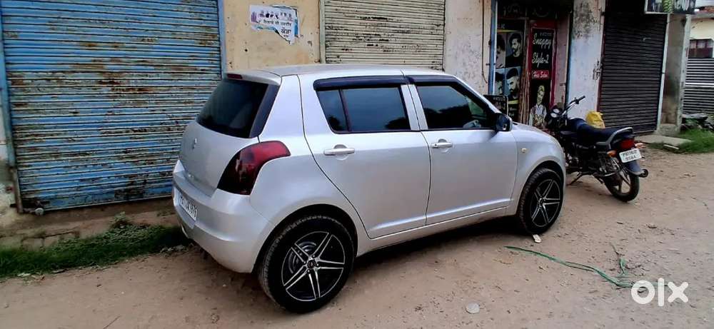 Maruti Suzuki Swift Lxi 2011